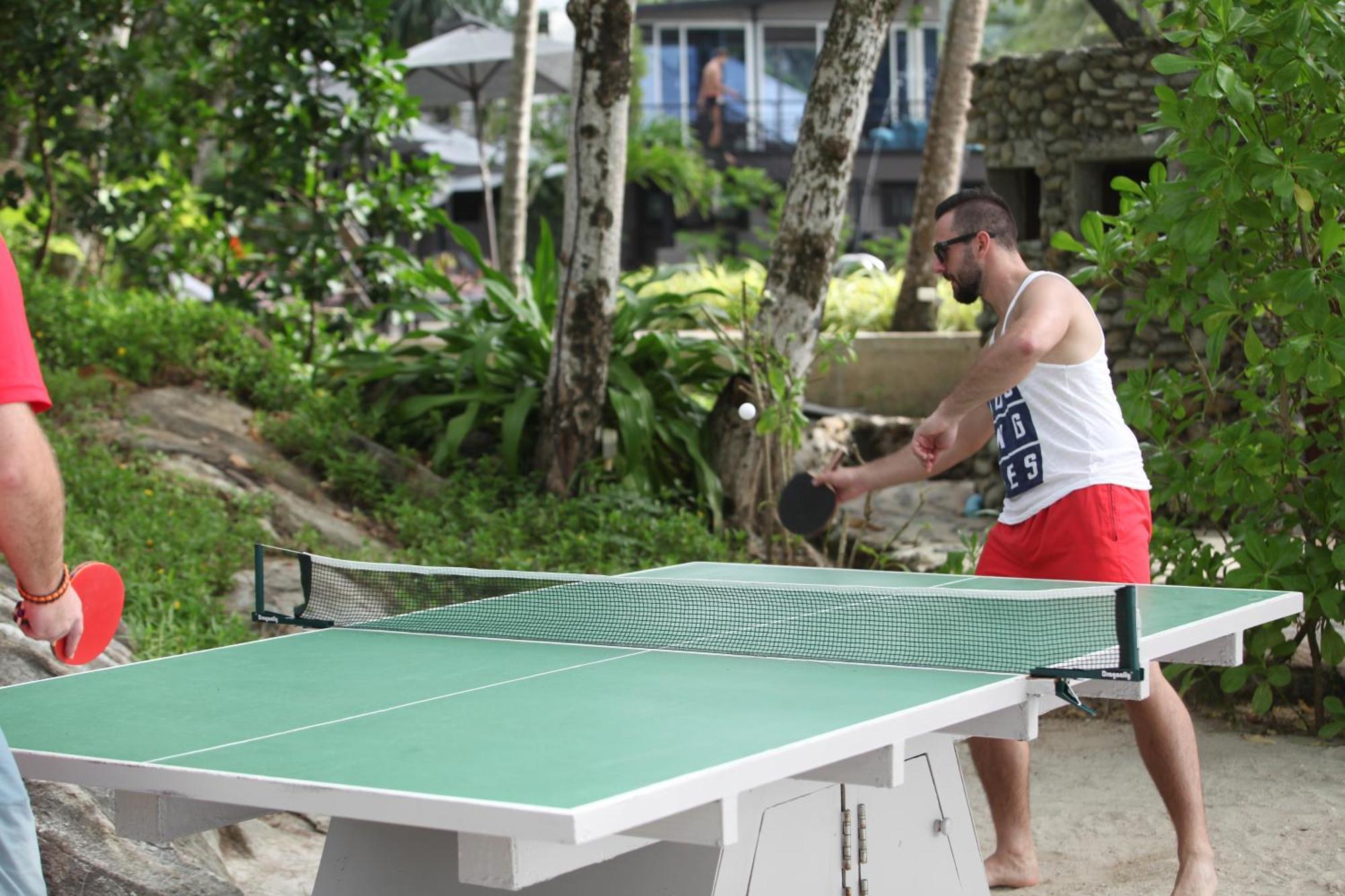 Moracea By Khao Lak Resort Exterior photo A table tennis player