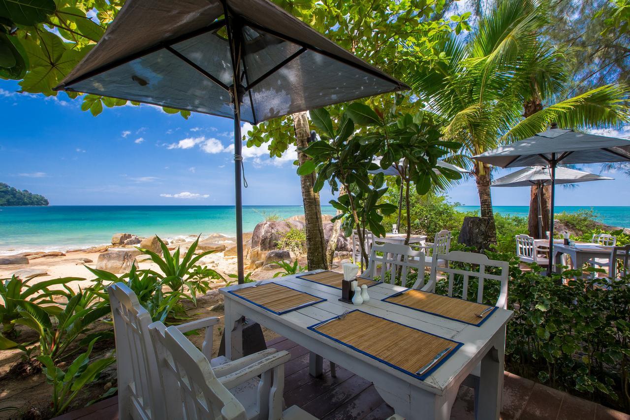 Moracea By Khao Lak Resort Exterior photo A restaurant on the beach